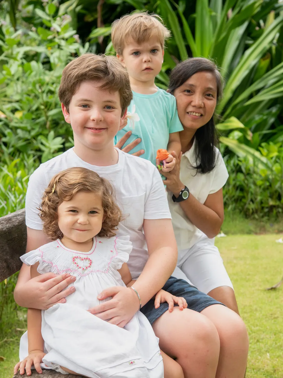 Family portrait in a tropical garden