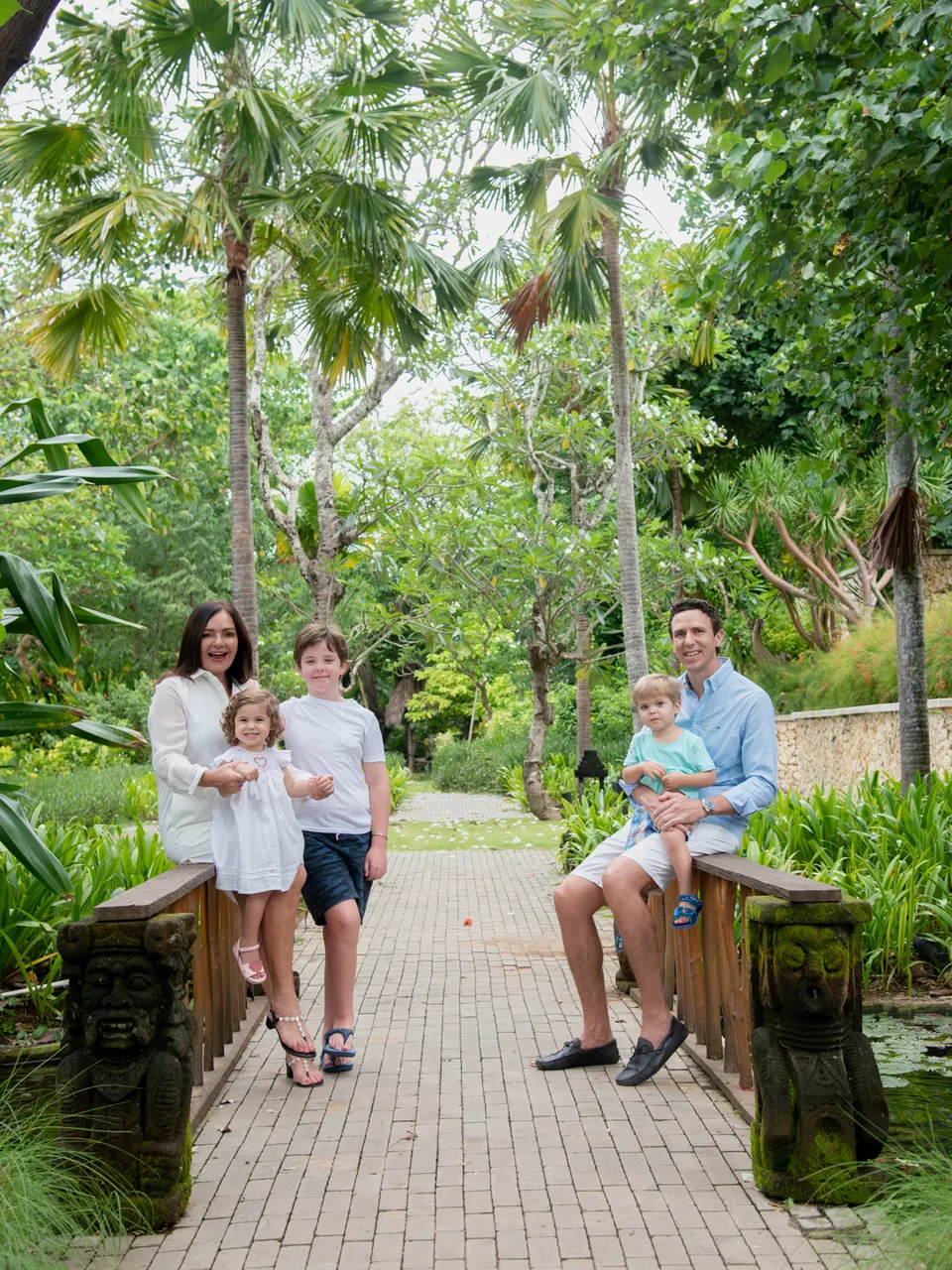Family portrait in a tropical garden