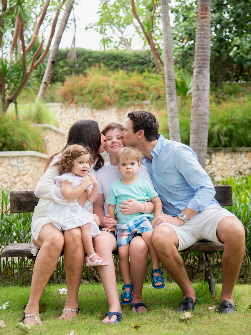 Family portrait in a tropical garden