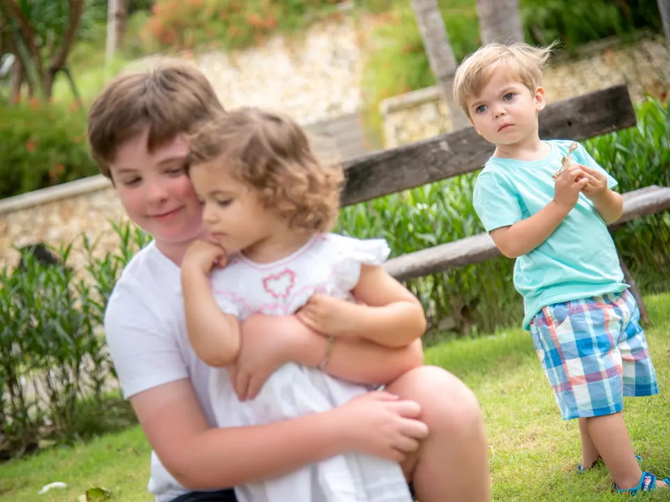 Children together in a tropical garden